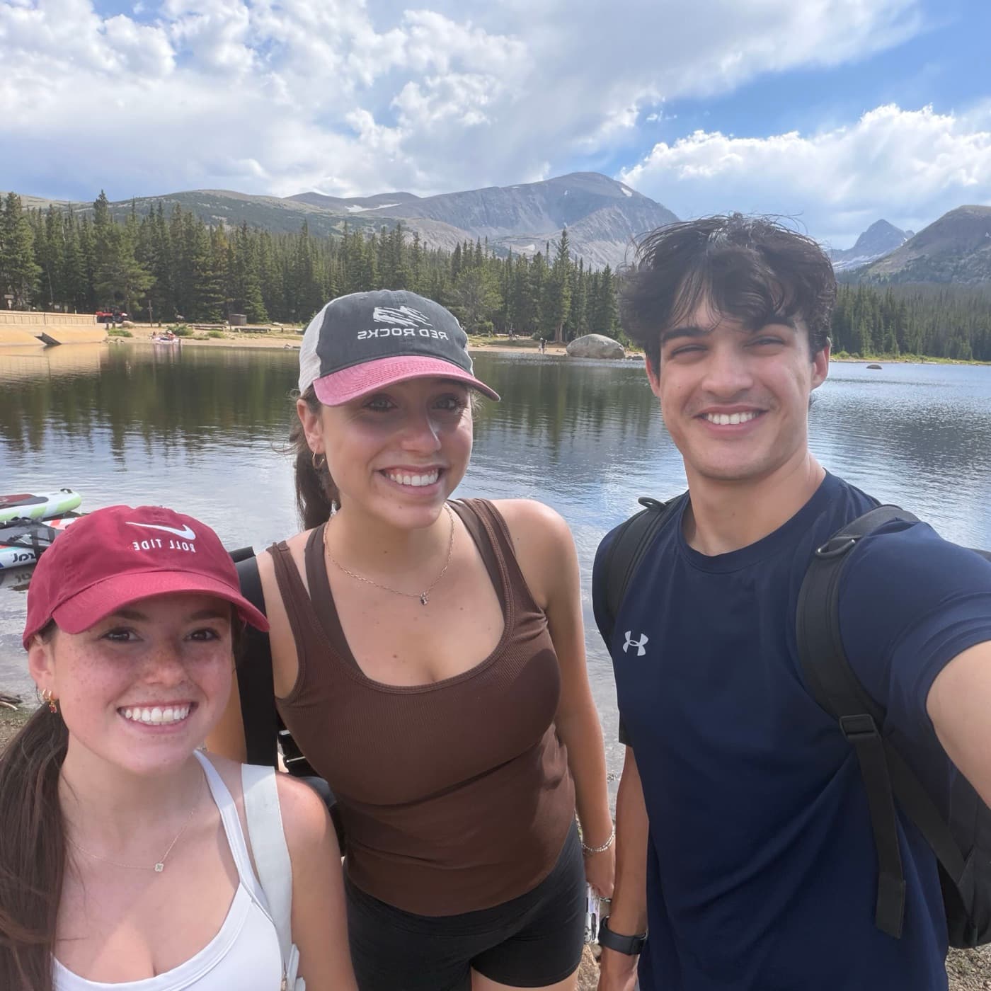 Interns at an alpine lake in the Colorado Rockies