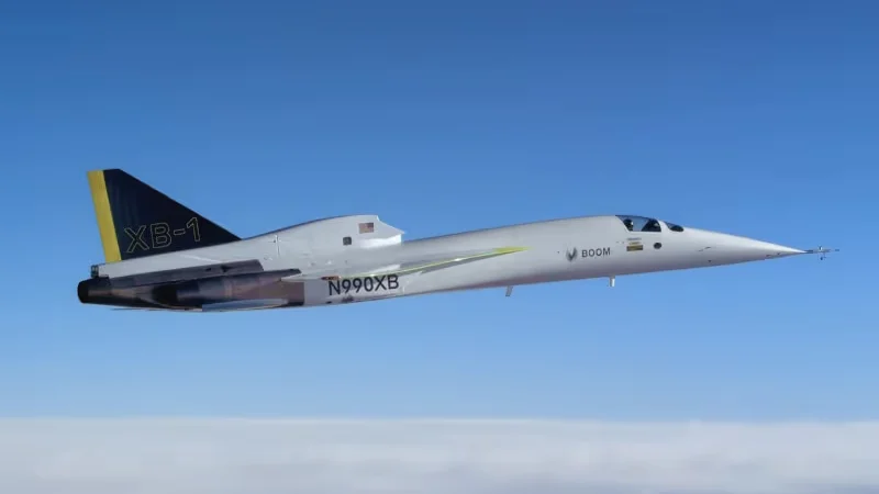 XB-1 in level flight above the clouds, seen from its side