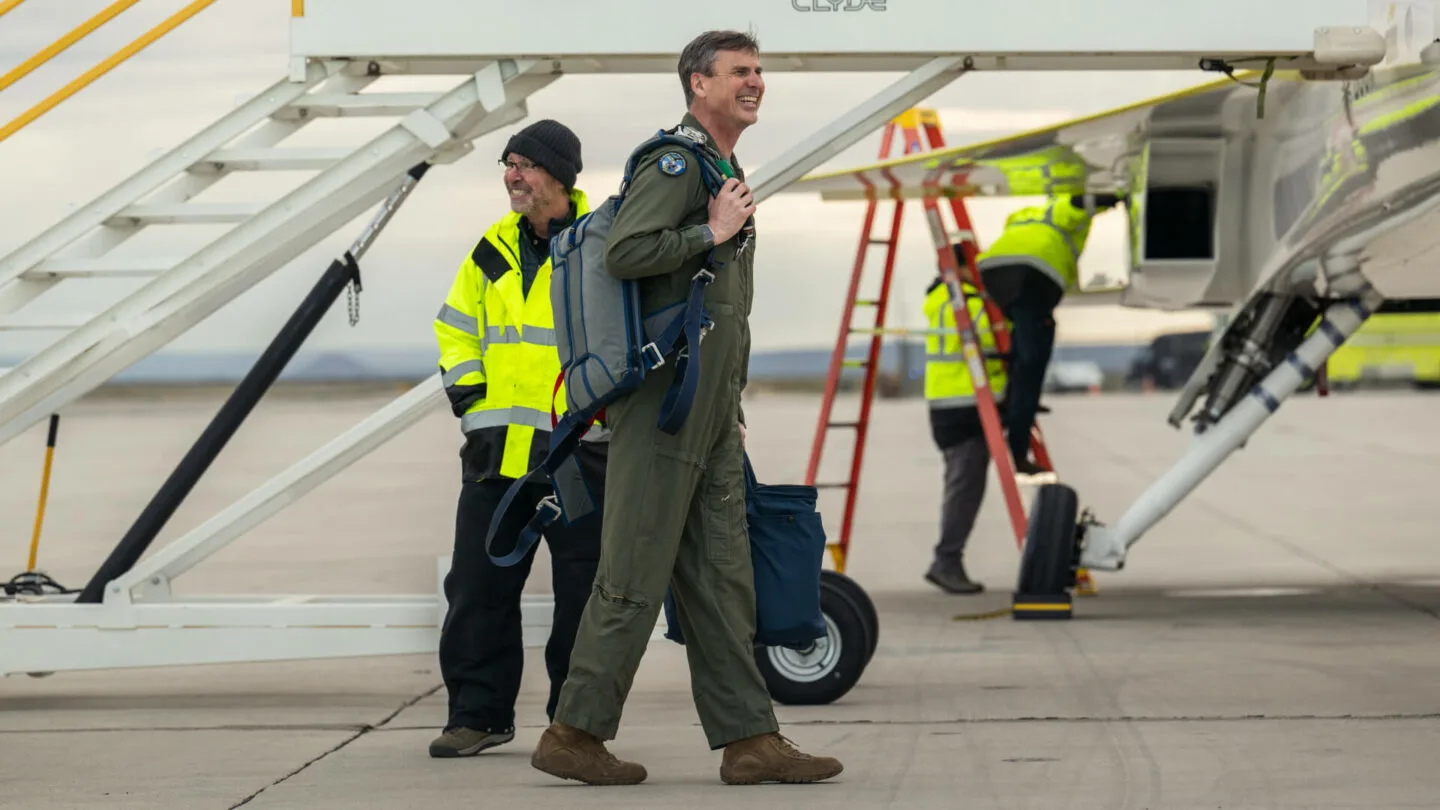 Bill 'Doc' Shoemaker walks toward Boom's supersonic demonstrator, XB-1 before first flight, on the runway at Mojave Air & Space Port.