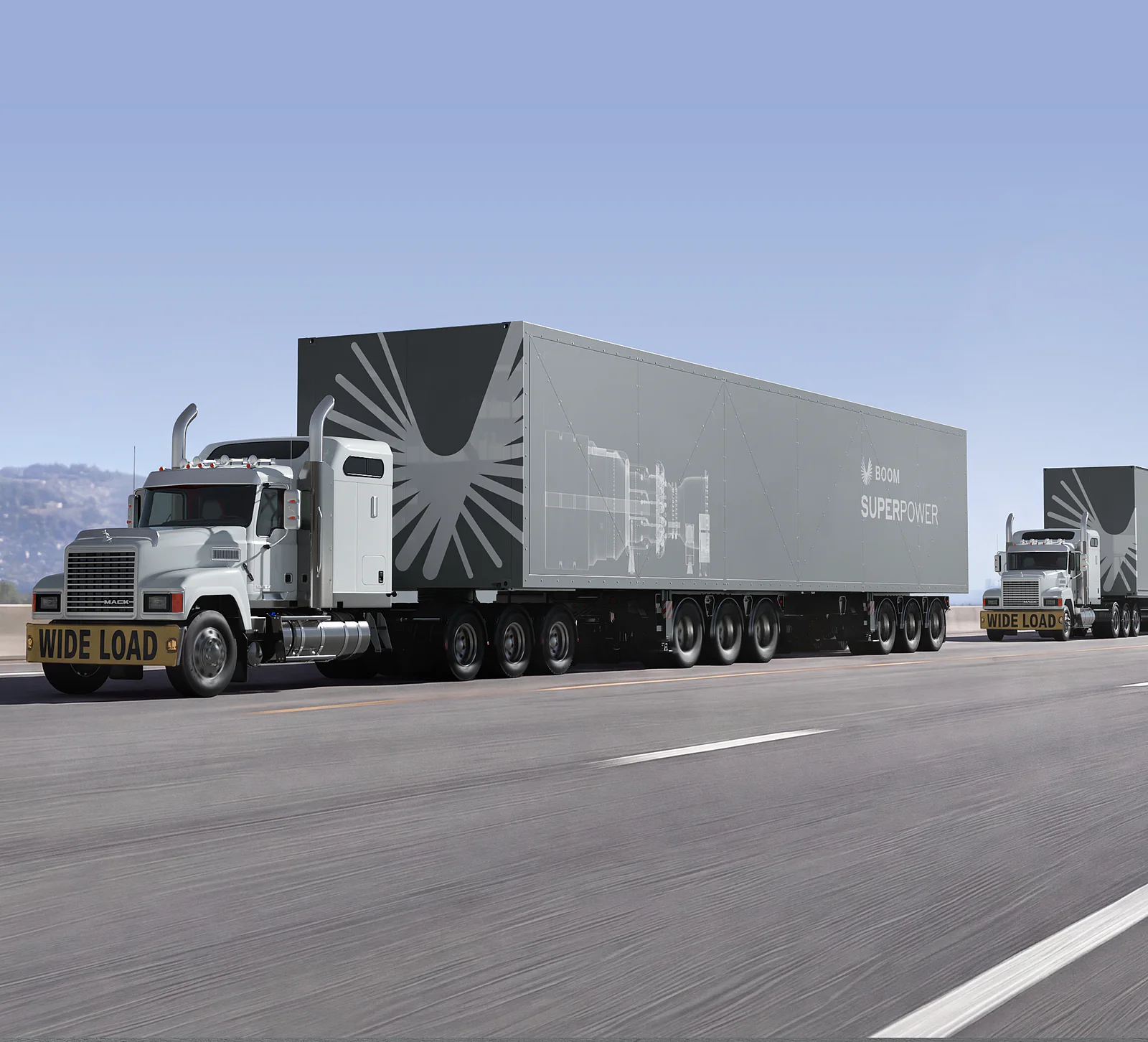 A convoy of Superpower trailers on the highway, each marked Wide Load