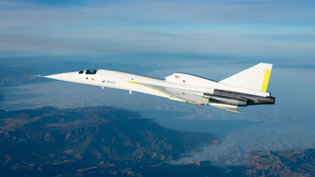 XB-1 over mountains, seen from above its right side
