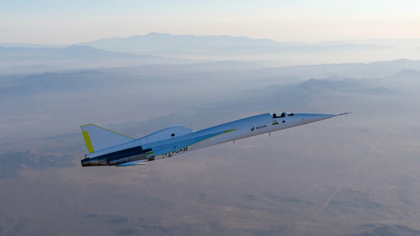 XB-1 flying above the desert, seen from above its left side